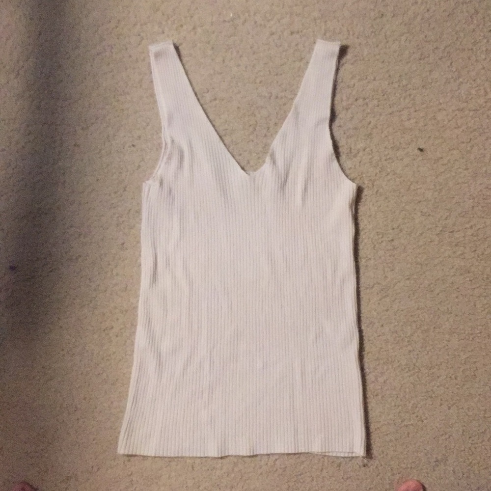 A cream tank top.